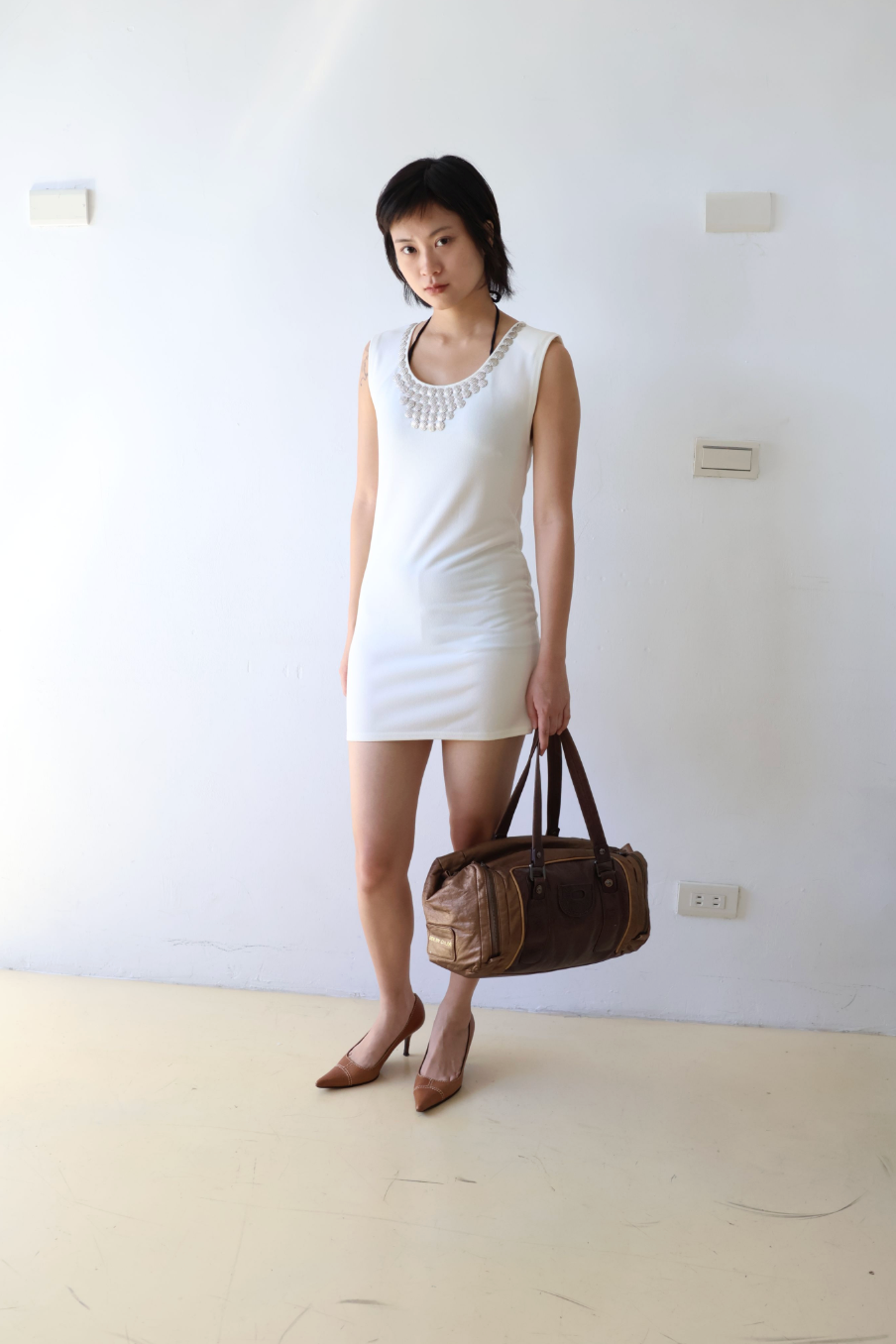 Sleeveless Crewneck Dress with Metal Hardware in Cream